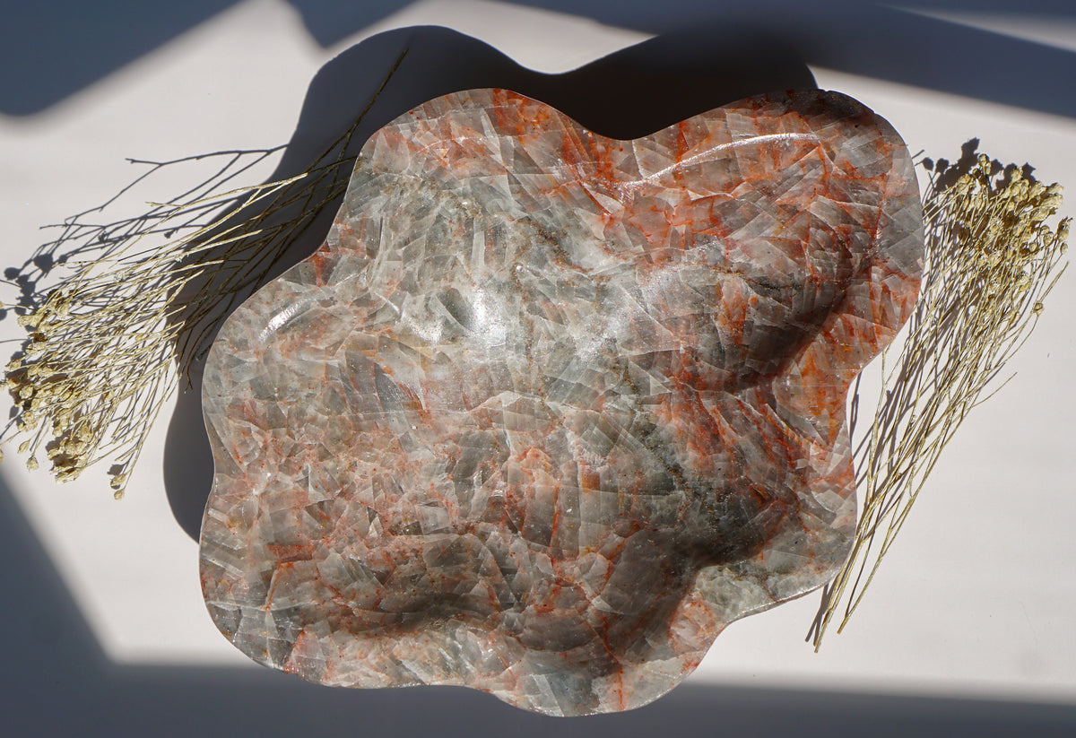 Top-down view of empty Blue Calcite hematite bowl showing grey-blue coloring and rust veining