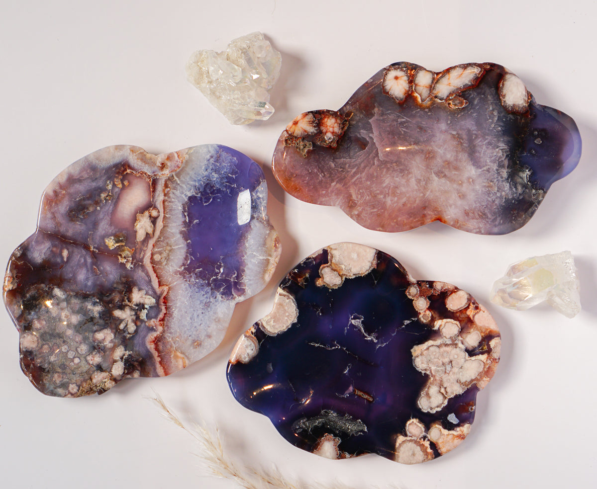 Blue Flower Agate dish grouped with quartz crystals and other natural agate dishes