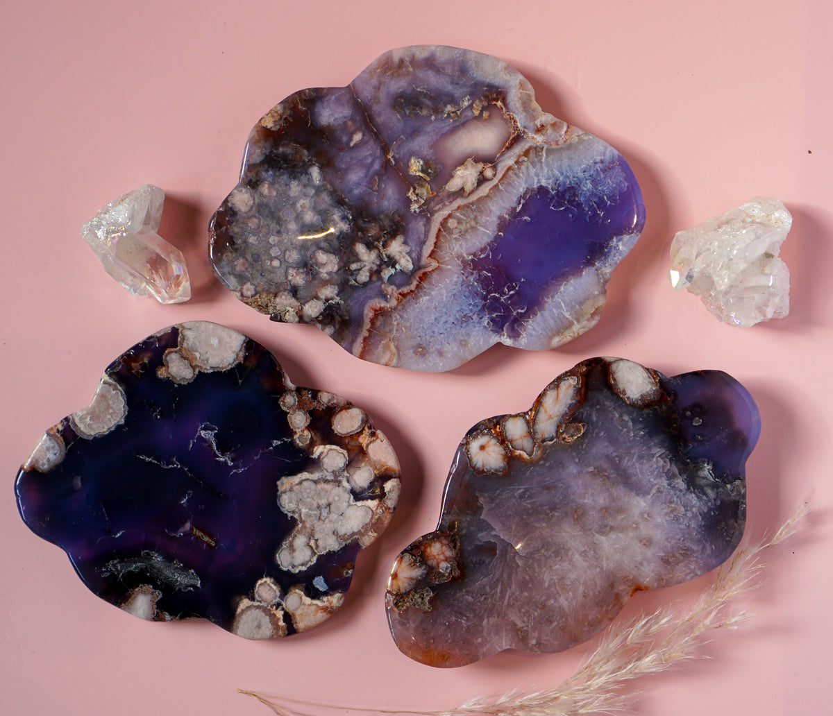 Blue Flower Agate dish styled with quartz points on pink background