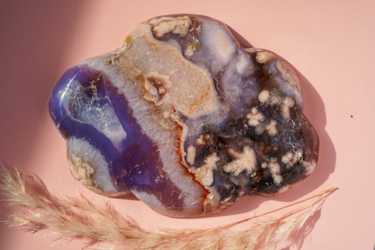 Blue Flower Agate trinket dish showing deep purple pocket and druzy blossom clusters